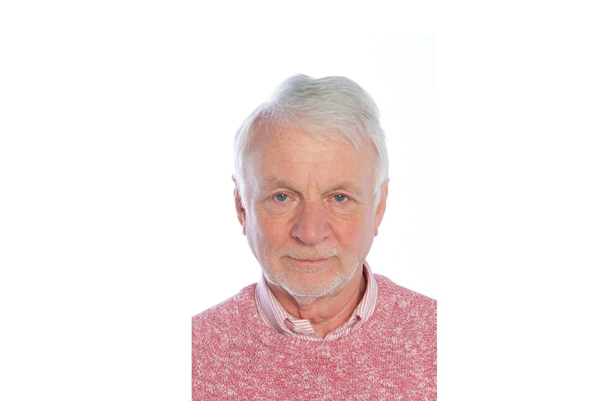 Peter Dewhurst in red jumper portrait photo