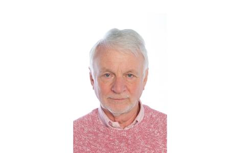Peter Dewhurst in red jumper portrait photo
