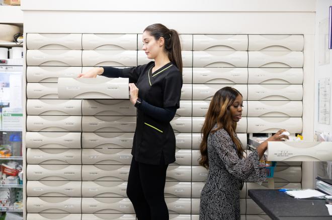Two pharmacy staff in pharmacy